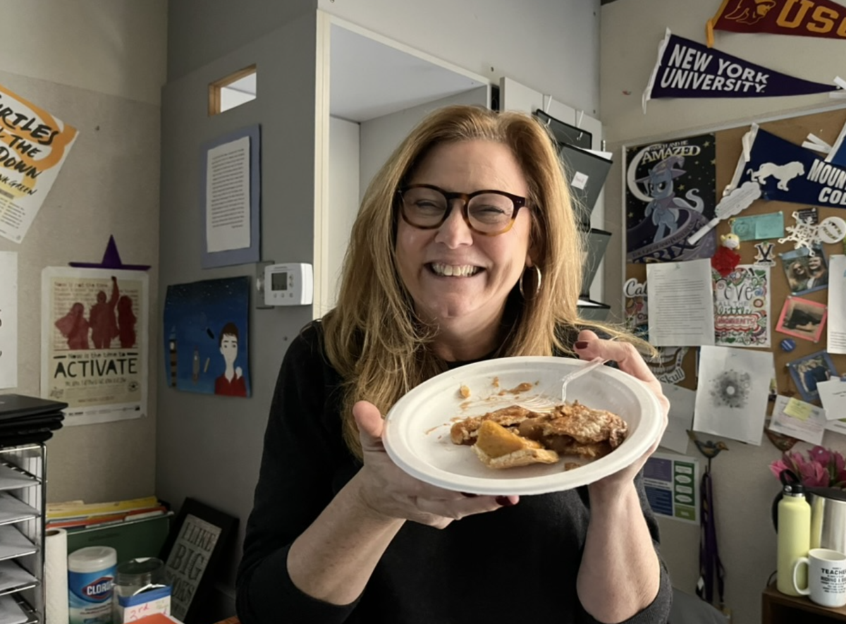 English teacher Amy Suto enjoys a slice of apple pie.